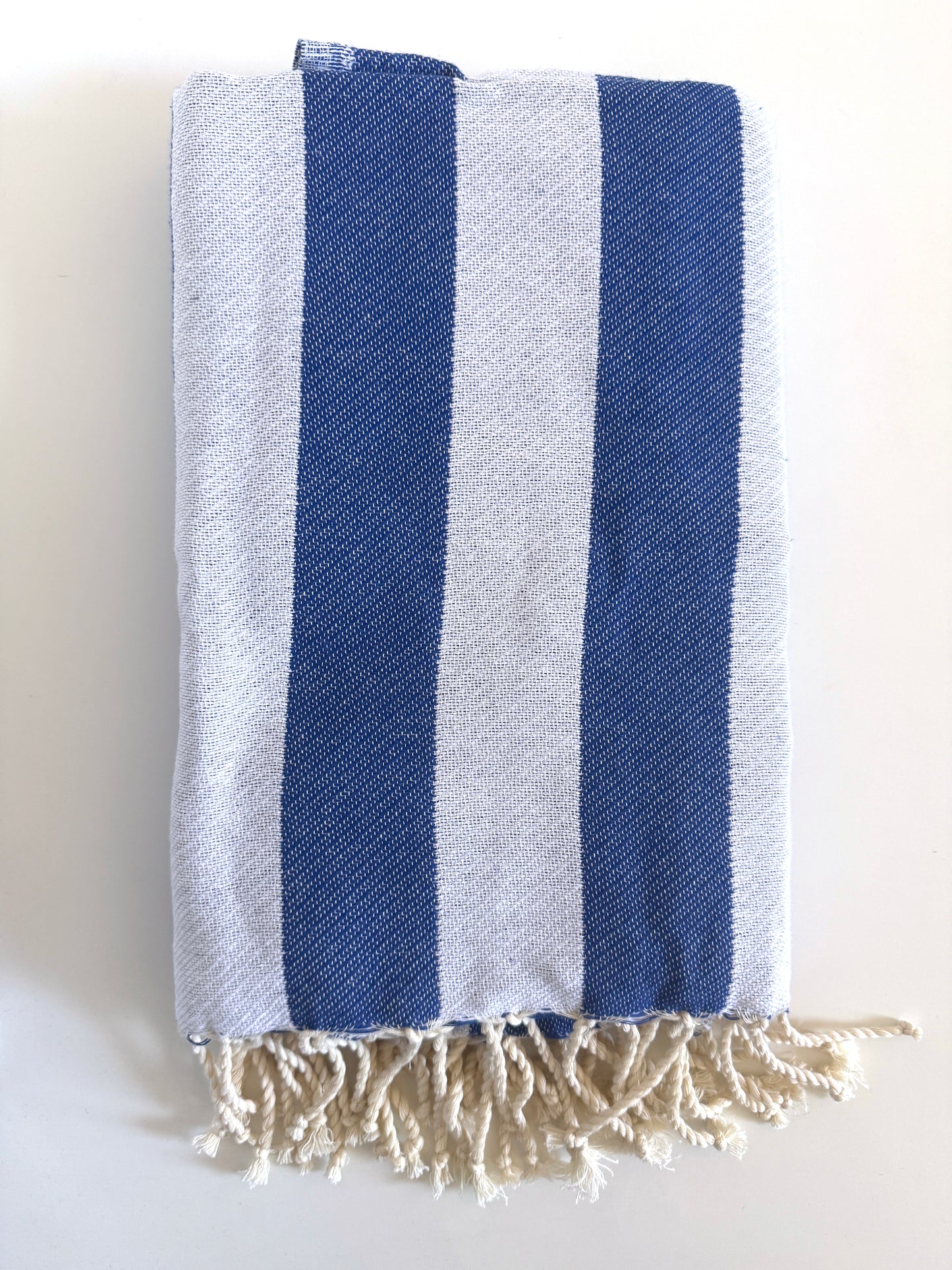 Telo mare a righe blu e bianco